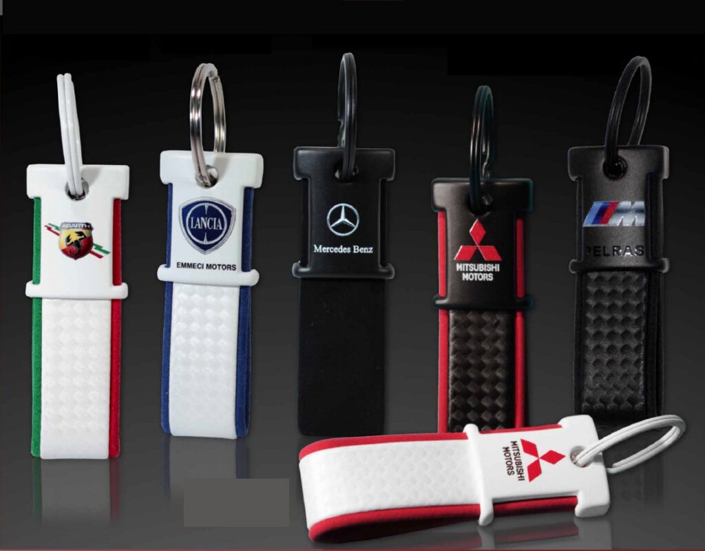 Gepersonaliseerde sleutelhangers met automerk logo voor autodealers